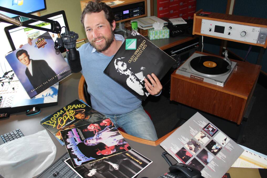 RICK ROLLED: ABC South East breakfast presenter Simon Lauder gets nostalgic with some vinyl offerings from the radio station's collection.