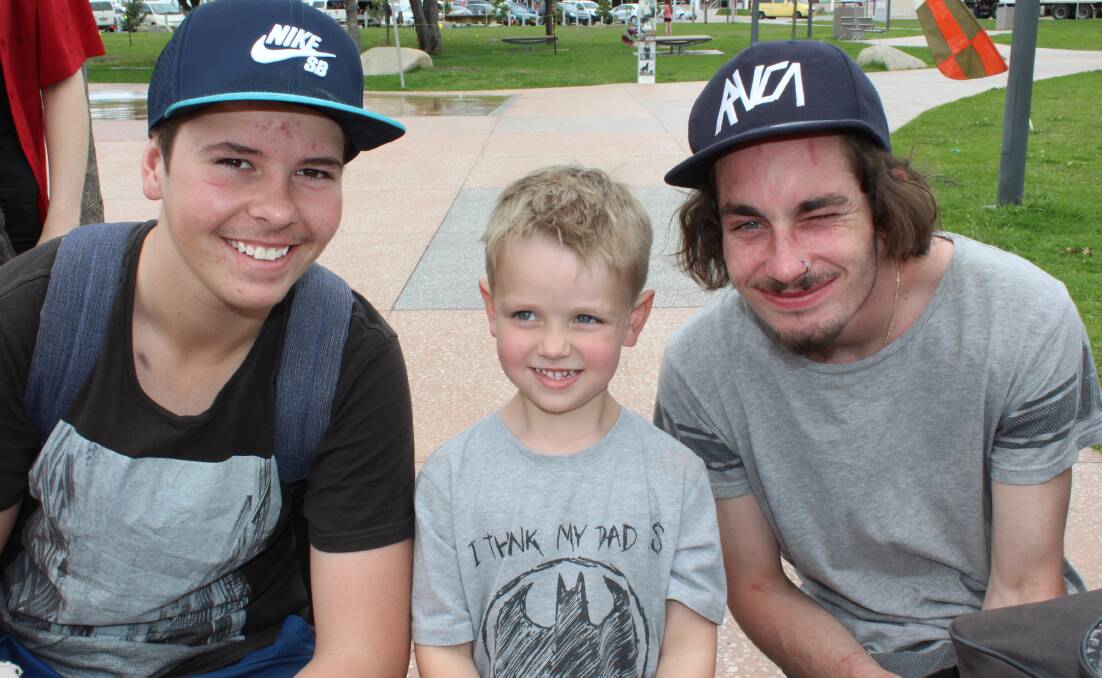 SMILE: Friday was World Smile Day, with Zack, Aaron and Josh cracking grins in Littleton Gardens. Aaron says "dinosaurs and Transformers" make him smile!