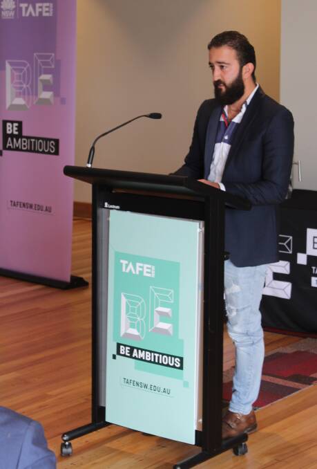 Mohammad Attar addresses his fellow TAFE graduates and their families at this week's ceremony. Photo: Ben Smyth