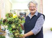 Helen Slater of the Hillgrove House Auxiliary prepares Anzac Day wreaths. Picture file