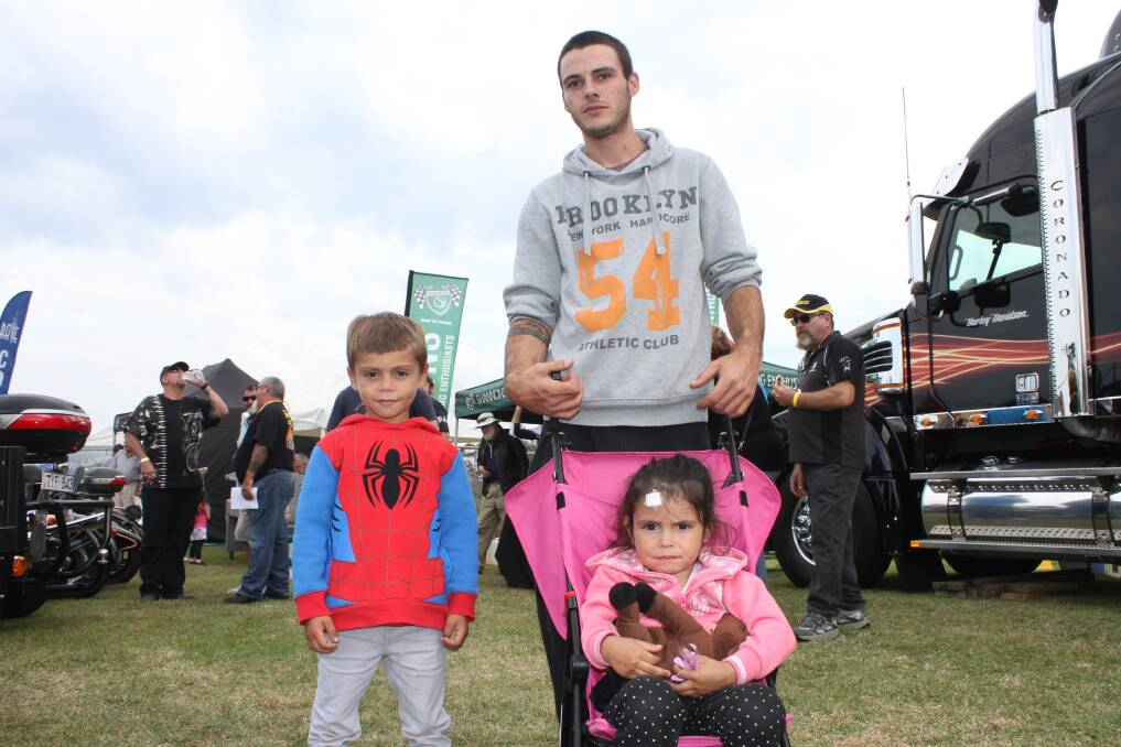 Toby Youlten with his son and patched-up daughter attend the CRAB Bermagui Bike Show in late April 2016.