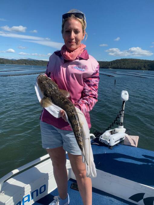  Jacqui Hancock of Millingandi shows off a lovely dusky flathead caught and released in Pambula Lake.