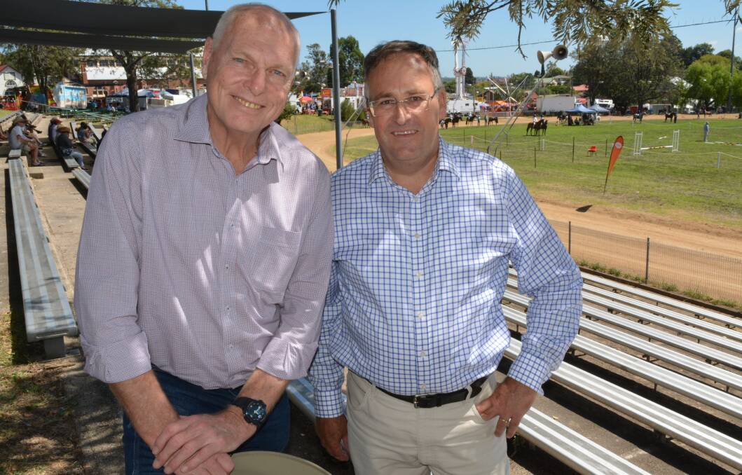 MEETING COMMUNITY: Liberal Senator for NSW Jim Molan and party member Nigel Catchlove enjoy the sights of the 2018 Bega Show.