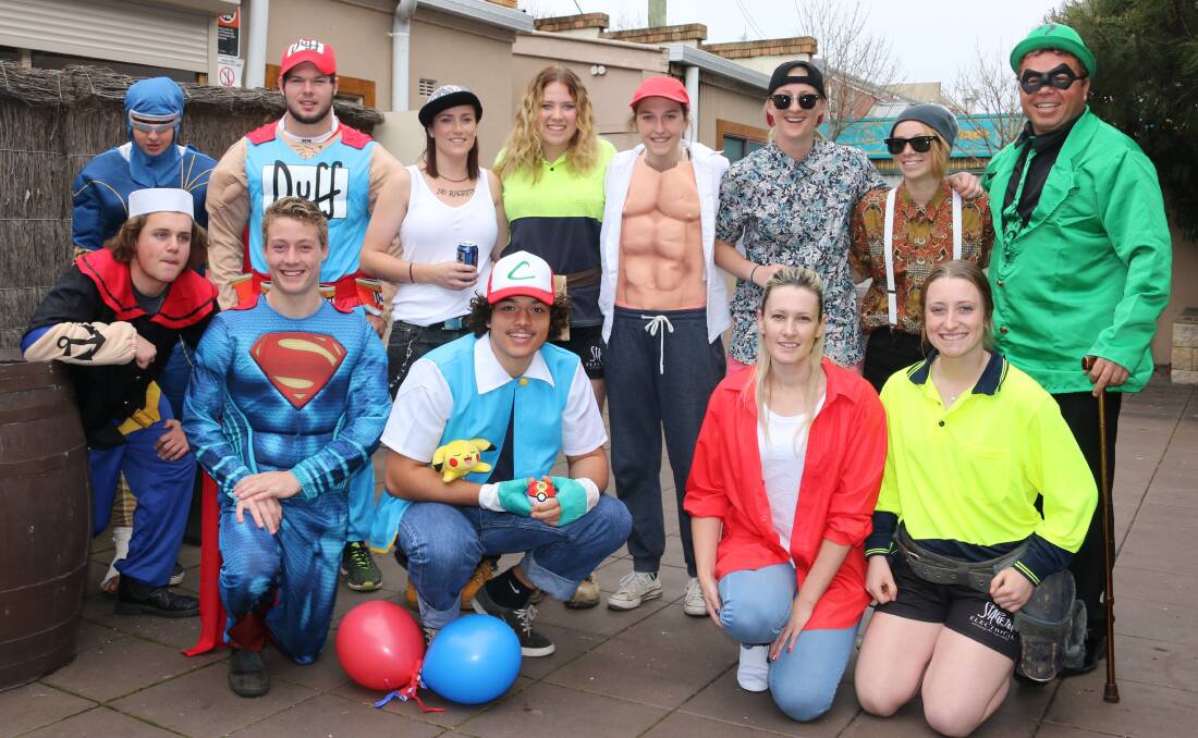 MAD MONDAY: Players from the Bega Roosters under 18s and Chicks league tag teams celebrate their grand final victories at the Grand Hotel, Bega.