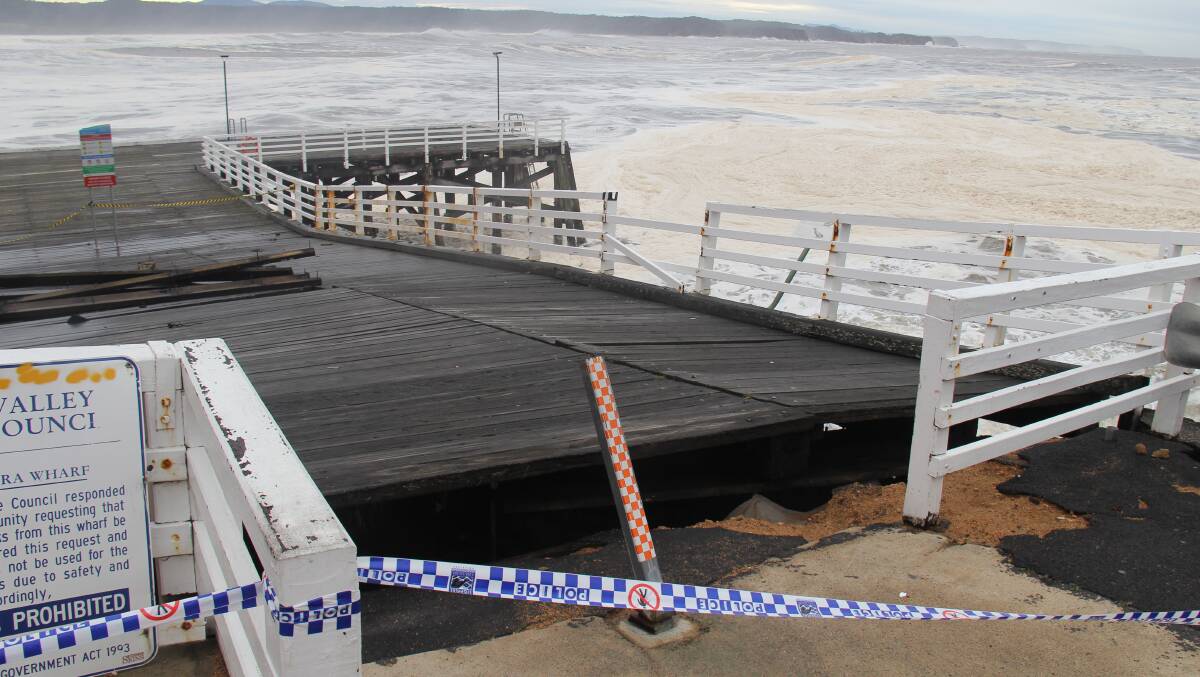 Tathra Wharf lifted off pylons by huge surf