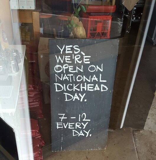 This controversial sign briefly appeared outside a cafe in Bermagui ahead of Australia Day 2016.