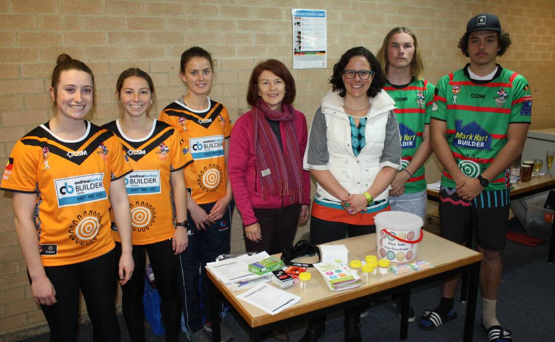 HEALTHY LIVING: Young footy players from the Bega Chicks and Roosters take part in an info session on drug and alcohol safety and sexual health. Report online.