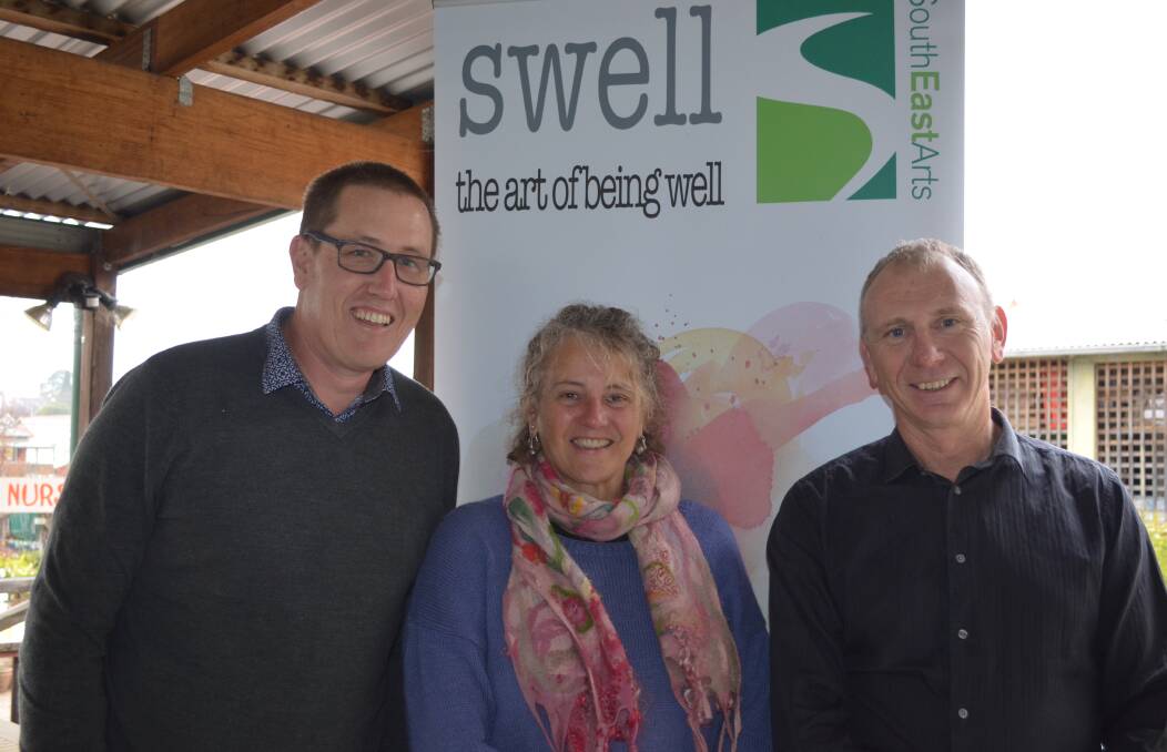 SWELL IDEA: South East Arts' new chairman Ian Campbell chats with new arts and health project officer Gabrielle Power and general manager Andrew Gray. 