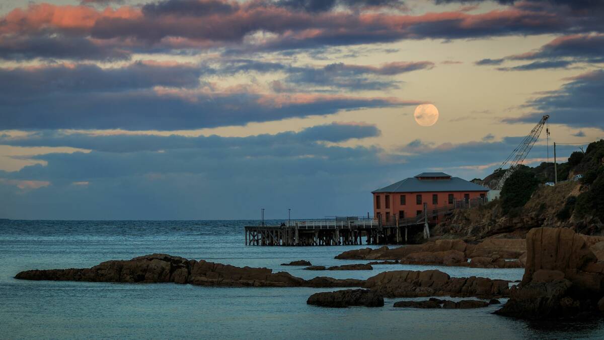 MOON RISE: Monday night's "supermoon" rises above the Tathra Wharf in this photo taken by BDN journalist Jacob McMaster. More photos, begadistrictnews.com.au
