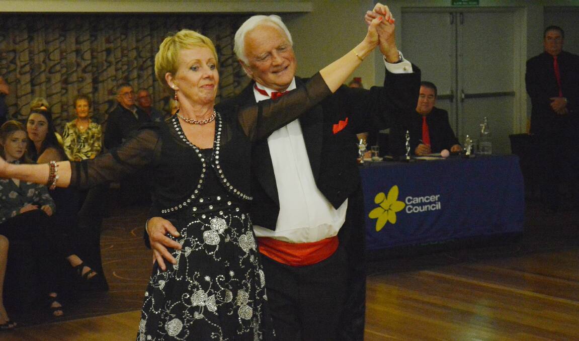 GALA FUNDRAISER: Debbie Gardiner and her dance teacher Dave Boulton waltz across the Club Sapphire dance floor on Saturday night.