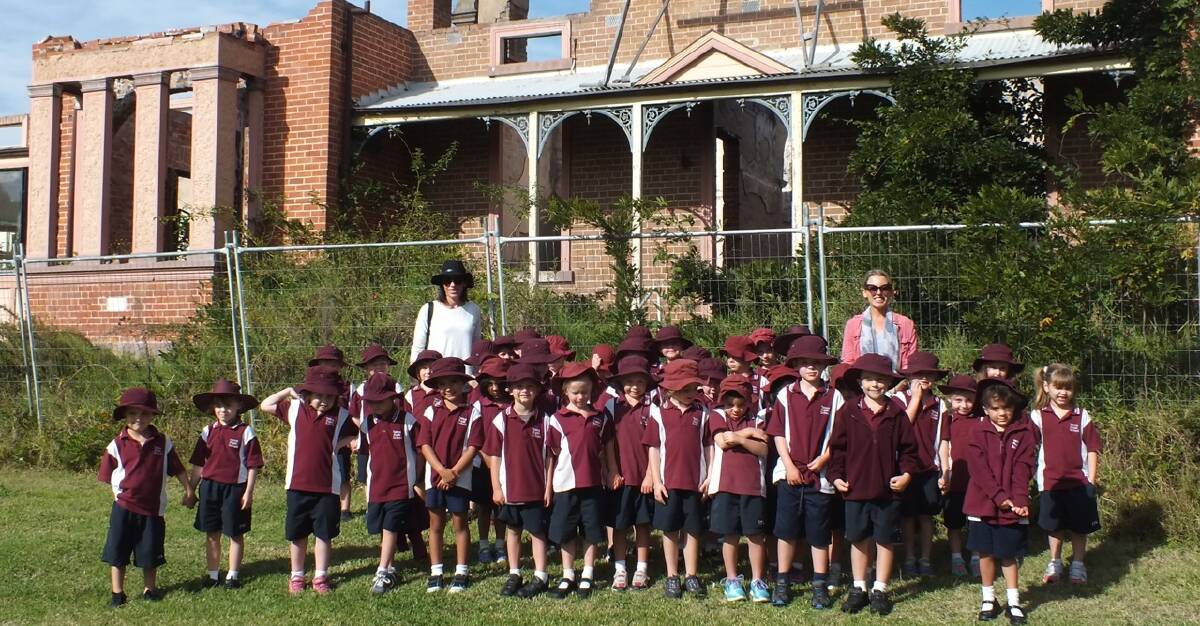 HISTORY PROJECT: Tathra pupils with teachers Angela Mundy and Megan Bobbin visit the historic Old Bega Hospital during a recent excursion.