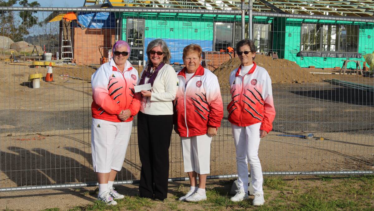 Eden Bowling Club ladies Heidi Wilesmith, Kathy Rogers and Irela Nixon surprise Lynne Koerbin with a generous donation to the SERH carers accommodation project.
