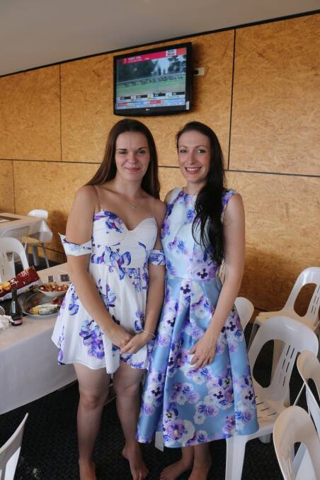 RACE DAY: Breanna Holley and Holly Murray enjoy the view of the track from the sponsors' lounge during the Bega Cup Carnival on Sunday. 