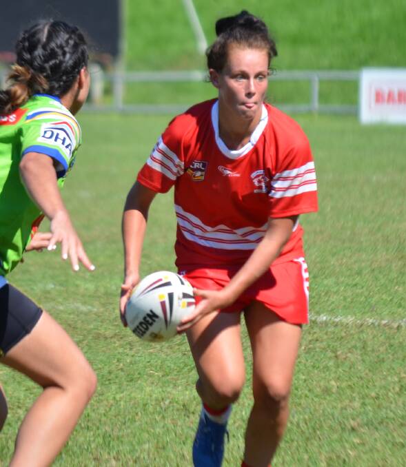 PLAYMAKER: Bomaderry's Talia Atfield looks for a pass during her Illawarra women's rugby league side's four point victory against Canberra on Sunday at Mackay Park. Photo: KATE LOCKLEY