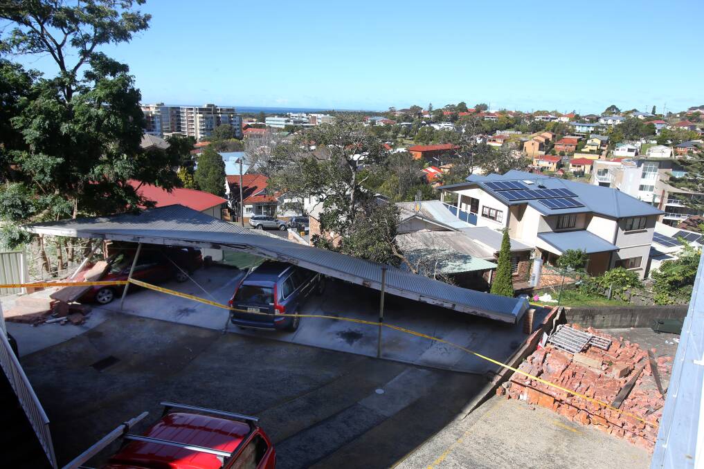 A carport at an apartment block opposite Wollongong Hospital collapsed in high winds. Picture: Rob Peet