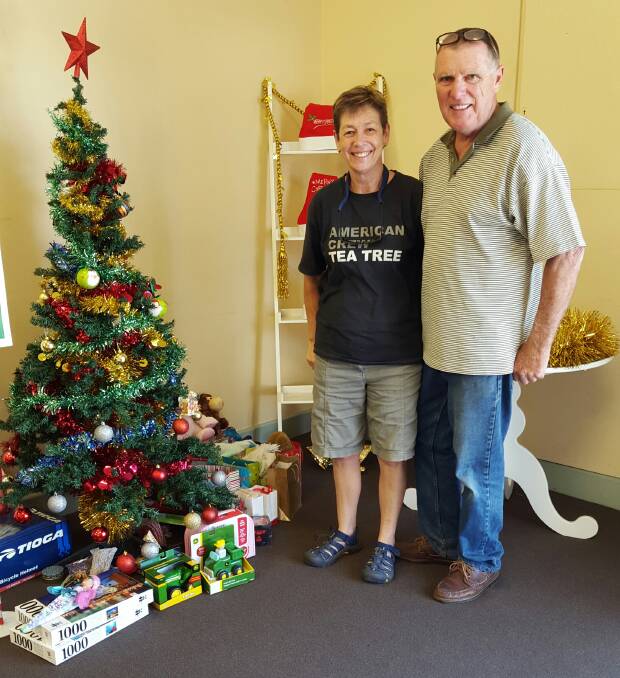 IT'S GREAT TO DONATE: Thank you to Jeanette and Phil came in to the Bega District News on Wednesday to drop off gifts for the Toy Drive and add to the growing pile.