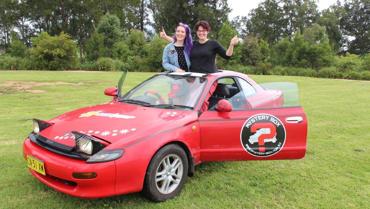 REVVED UP: Darcie and Sue Anne Nicol can't wait to hit the road in their Mystery Box Rally car. Photo: Alana Beitz