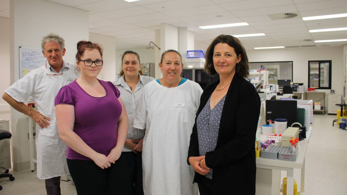IN OUR BLOOD: Hospital scientist Mick Hareward, Jessica Ford, Isa Green, Sharee O'Brien and supervising scientist Melinda Irving keep the pathology laboratory at South East Regional Hospital pumping around the clock.