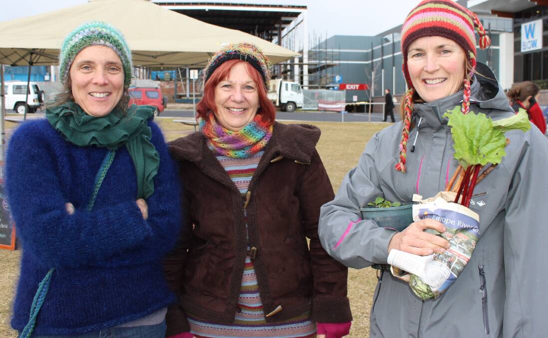 Winter green-thumbed: Tjenka Murray, Linda McMurray and Sandra Gauld at the SCPA Markets Seed Savers display in Littleton Gardens. Photo supplied: Julie Davis.