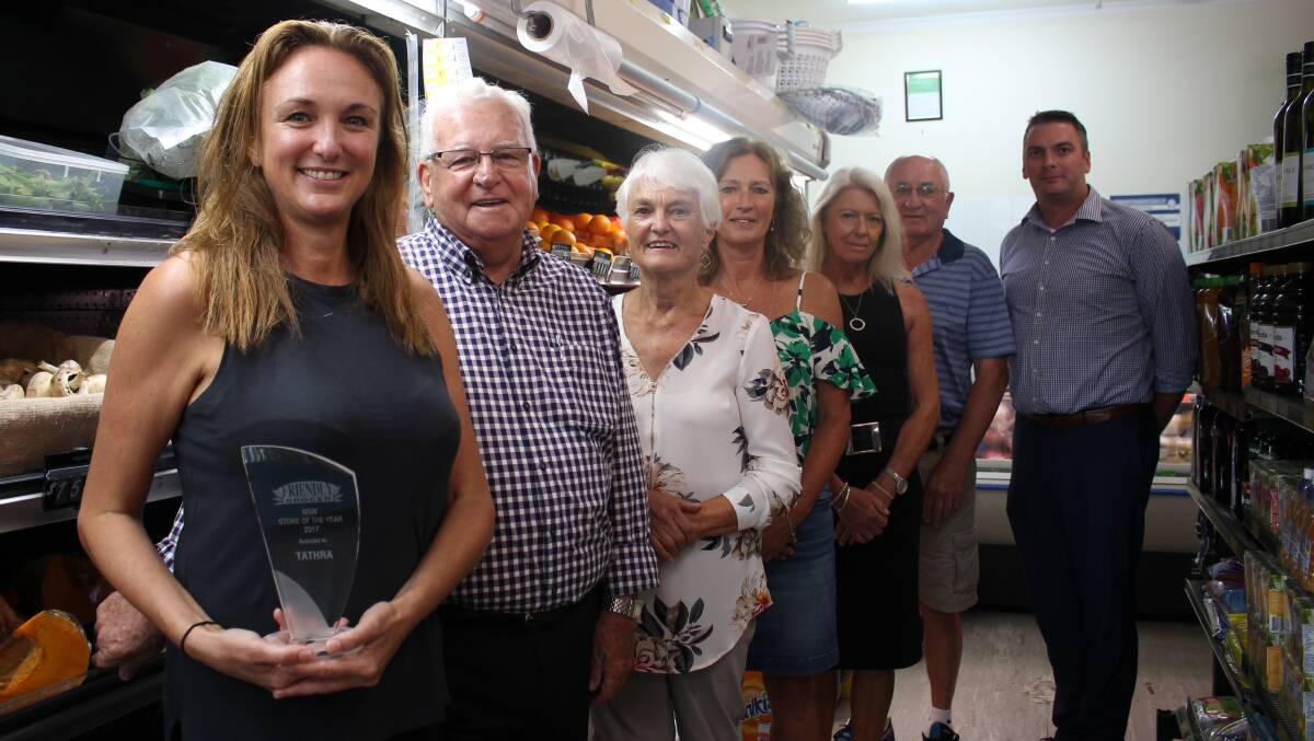 Tathra Friendly Grocer store owner Nicole Dowdle celebrated her win with Friendly Grocer chairman Terry Stehbens, Jim and Helen Buckley, Cainy Bowe, Sue Van der Meulen and Friendly Grocer CEO Anthony Van Roevan. 