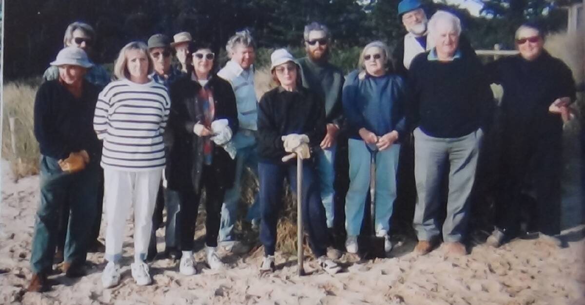 A LITTLE BIT OF TLC: Tathra Land Care volunteers on ground. The mission to eradicate bitou 25 years ago was initiated by Bill Caddey, Dave Greenland and Jim Kelly.