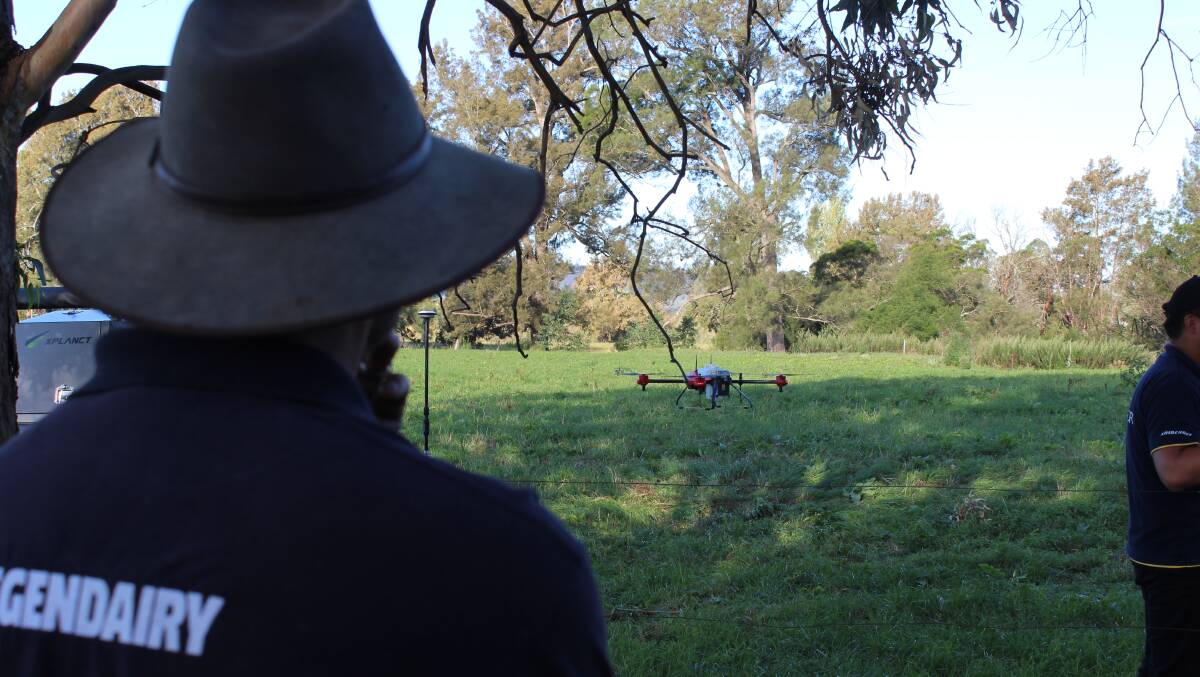 TECH TAKES FLIGHT: An attendee at the Bega AgTech days watches a drone demonstration at the Bega Cheese Heritage Centre. Picture: Alana Beitz