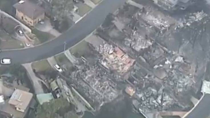 An estimated 70 buildings have been destroyed in a bushfire in Tathra. 

