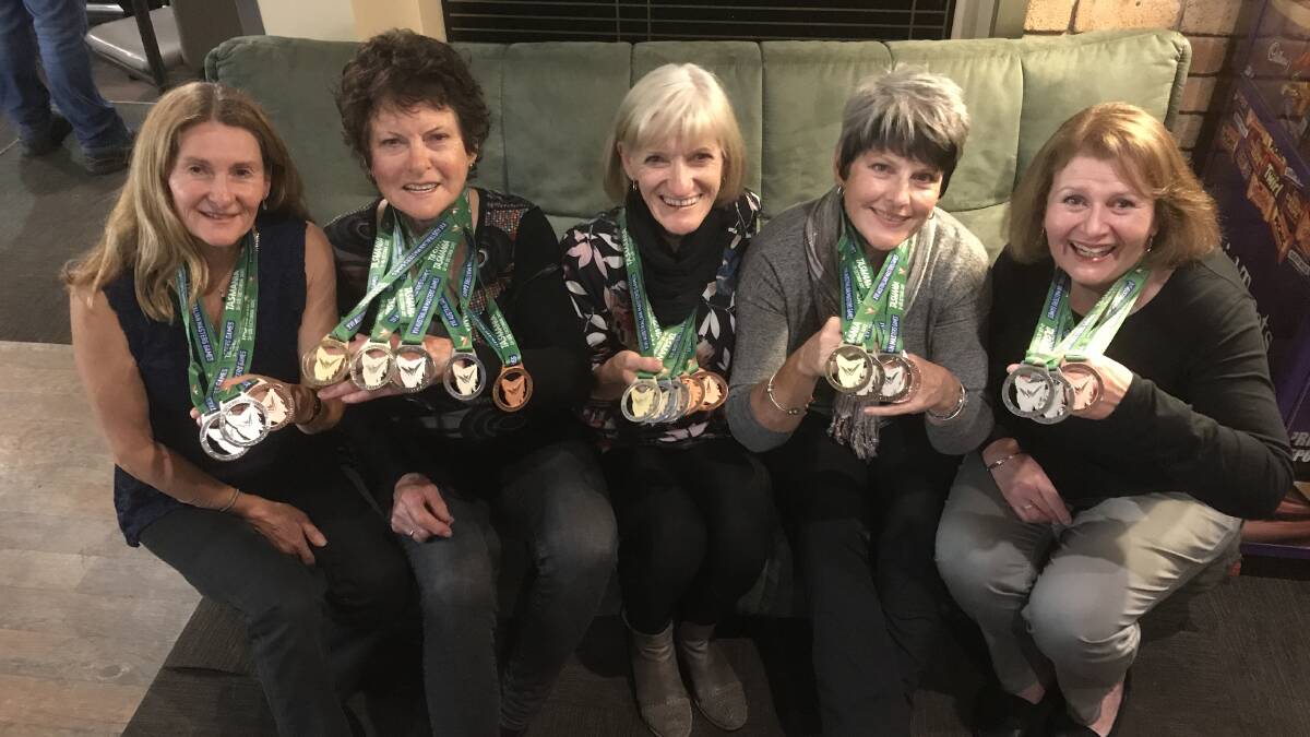 Medal tally: Eileen Quin, Liz Shaw, Heather Compton, Winsome Smith and Denise Dion show off their medals from the Australia Masters Games.