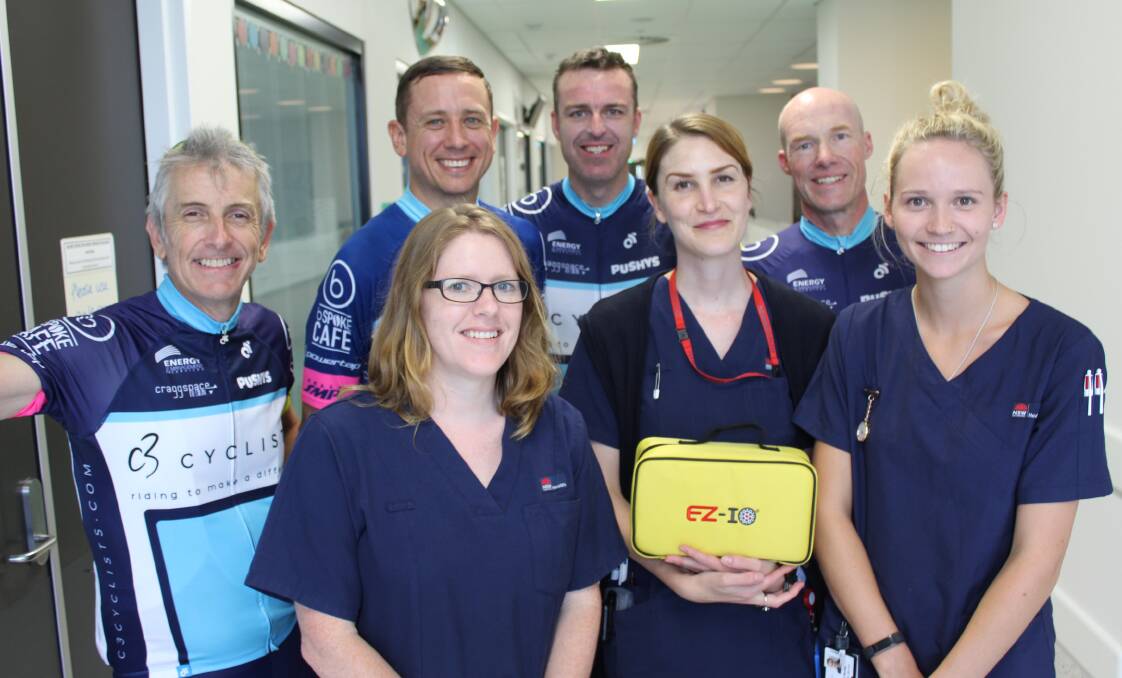 FOR THE CHILDREN: Bega hospital staff (front) Cynthia Lloyd, Pip Street and Beth Dixon meet members of the C3 Cyclists team on Thursday. 