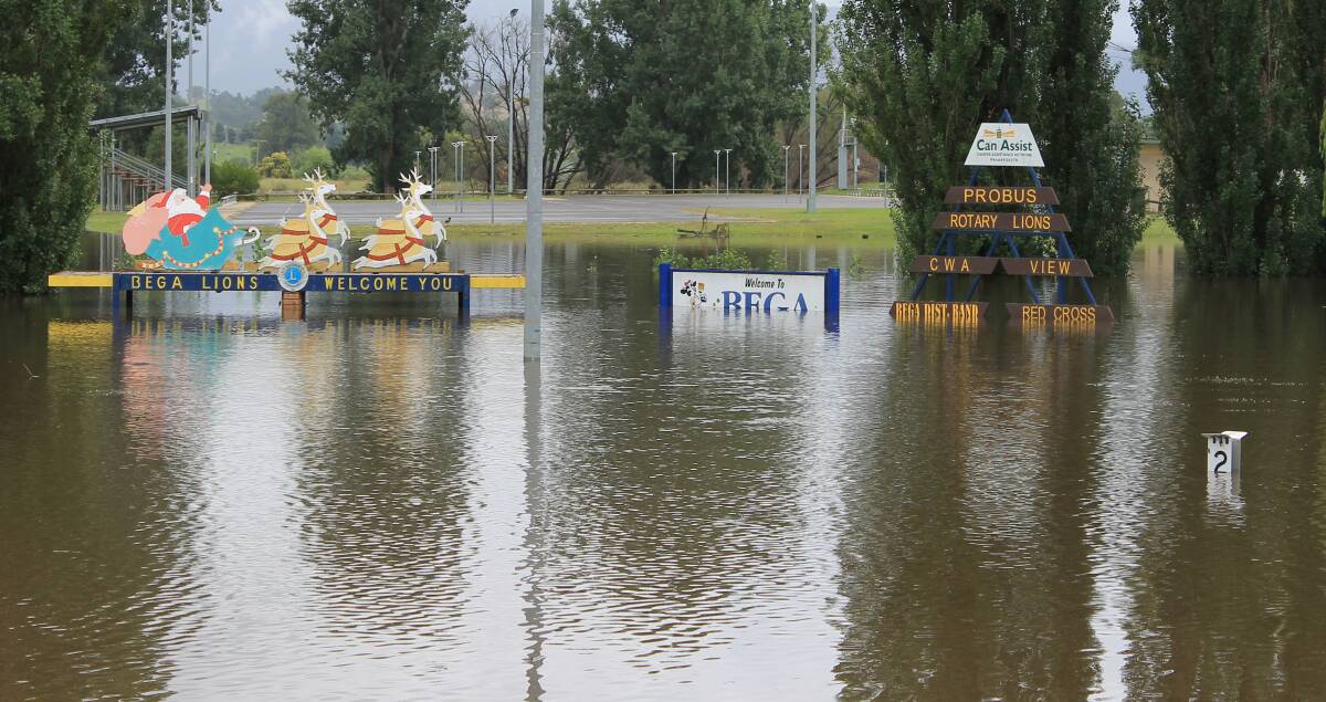 WELCOME TO BEGA: Carp St in Bega went under water on January 5 after the Bega River and Kiss's Lagoon flooded due to a couple of days of rain. As can be seen by the flood level on the right hand side, the water rose around two metres. 