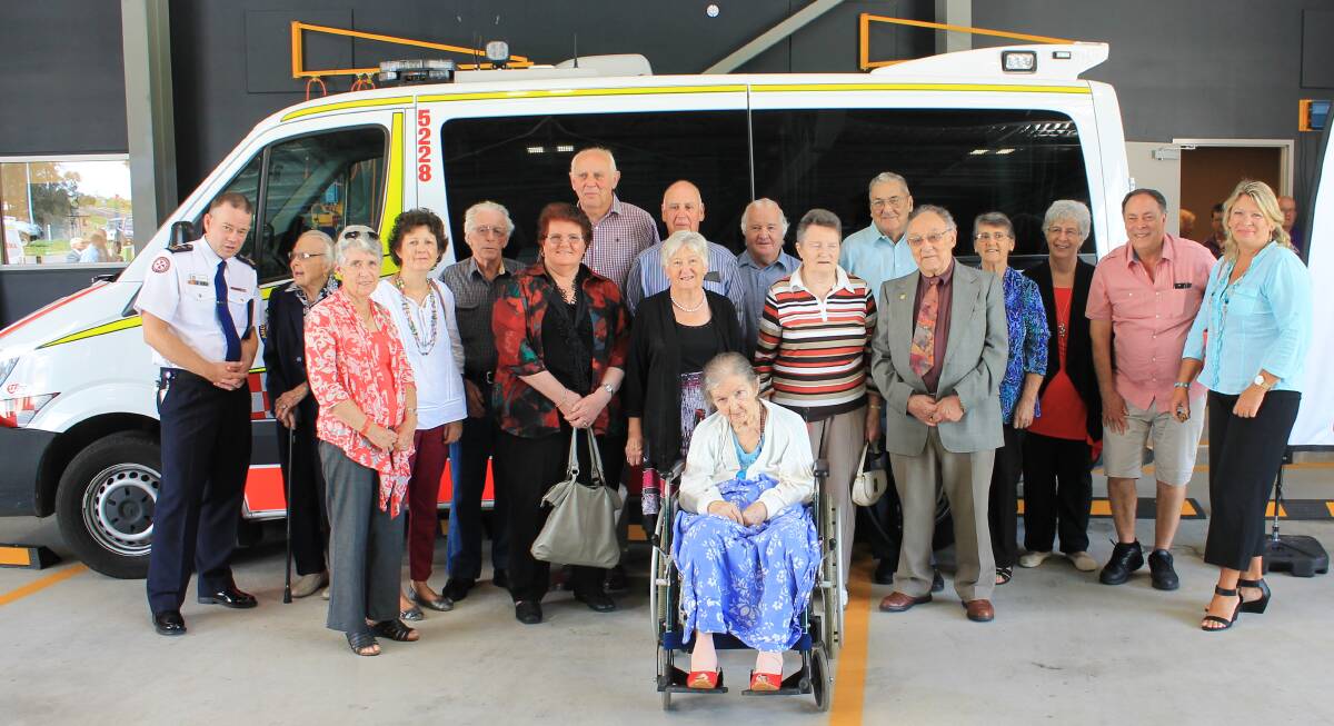 MEMORIES: Ex-members of the Bega Ambulance Service and their wives at the opening of the service's new station are NSW Ambulance acting chief executive David Dutton, Lucy Reeve, Sharon Whiting, Debra Sheers, Paul and Sue Mitchell-Davis, Bob Whiting, John and Colleen Manns, Malcolm Lucas, Dina Kruit, Barry Barlow, Dirk Kruit, Sandra Barlow, Sherry Lucas, David Sheers, Bev Tarlinton and (front) Betty Carriage. 