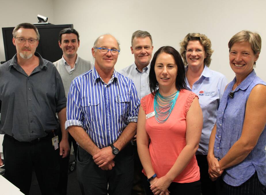 COMING TOGETHER: Health and lands service members at a meeting in Bega to discuss Q fever are David Clarke, Konrad Reardon, Peter Alexander, Duncan McKinnon, Lisa Stephenson, Helen Schaefer and Jen Manyweathers.