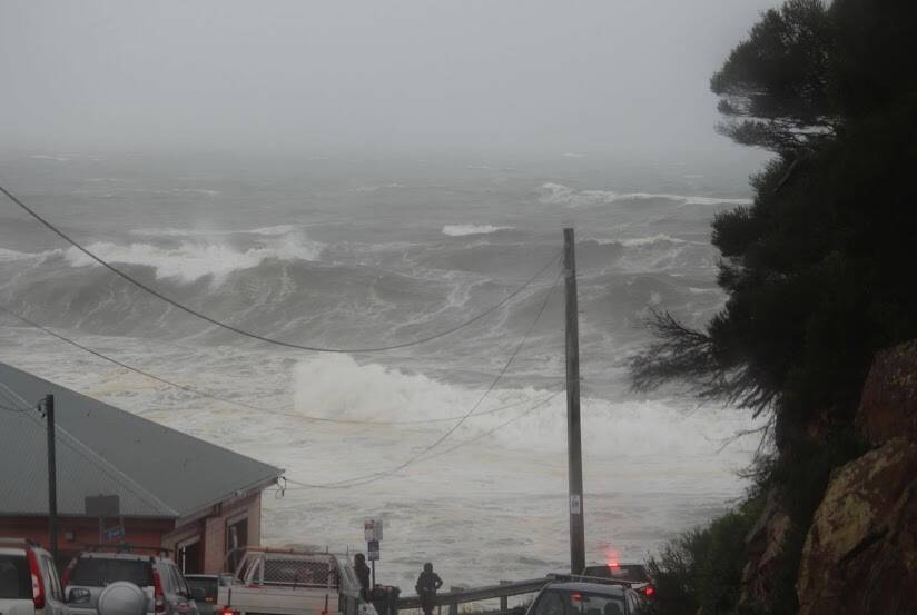 WHITE WATER: Huge surf battered the coast off Tathra Wharf over the weekend, causing a spectacle many Bega Valley residents came down to see. Picture: Wendy Brown Fox 