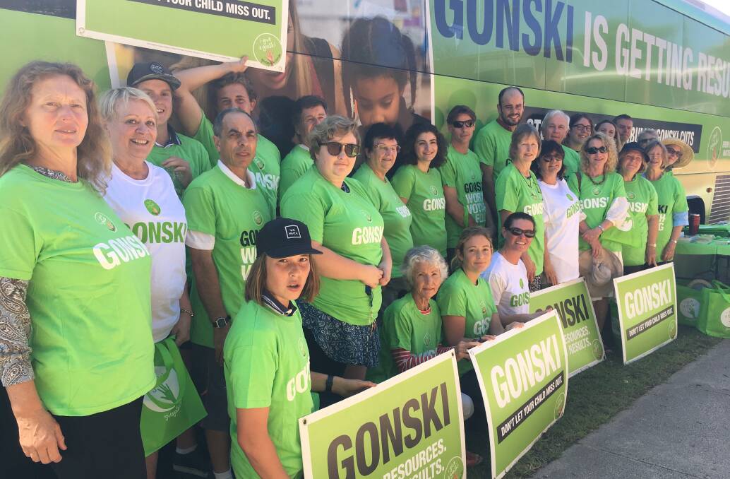 FOR EDUCATION: Bega High School staff and members of the community greet the Gonski bus when it stops in Bega on Monday while on its way from Adelaide to Canberra. Photo: Supplied