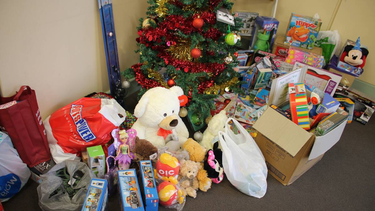 The growing pile of donated toys and gifts under the BDN Christmas Toy Appeal tree.