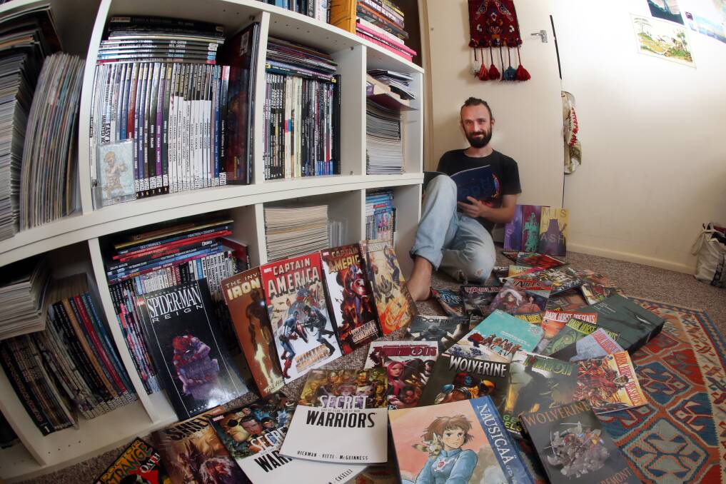Illustrator Louie Joyce found a love for comics from his parents, his father collected them and his mother drew comic characters. He's holding two workshops at Wollongong Art Gallery. Picture: Robert Peet