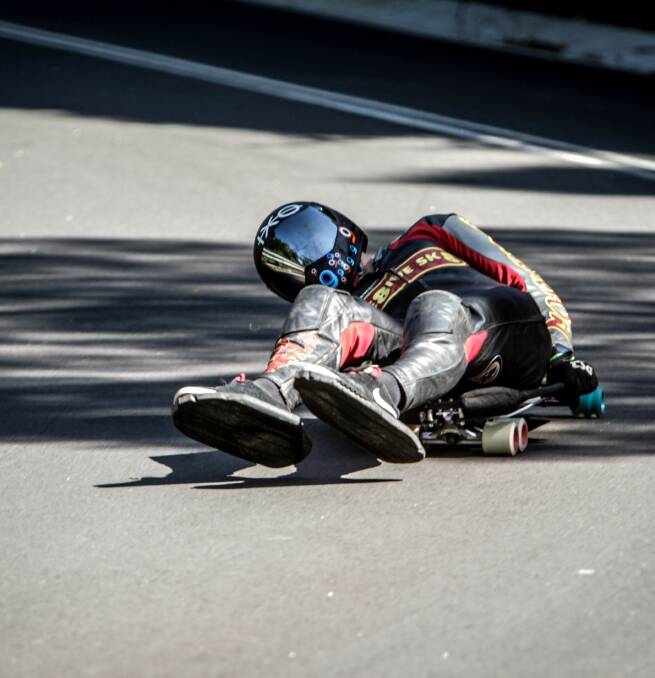 SLICK: A rider with modified shoes during a luge qualifying heat on Saturday. Abdil Mahdzan eventually won the category on Sunday. Picture: Georgia Matts
