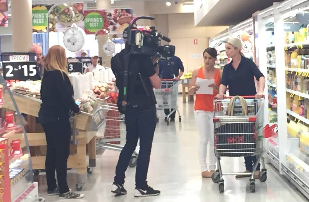 SPOTTED: Mell and Cyn, MKR 2017 contestants, shopping in Fairy Meadow on in November. The women grabbed eggs, sugar, sour cream and other items while a cameraman, sound man and two producers followed. Picture: Desiree Savage