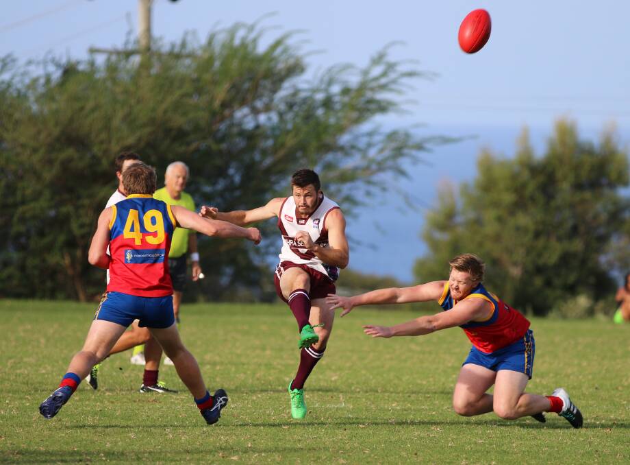 Support play: Bega-Tathra co-captain clears a kick between two Narooma Lions last Saturday and will lead the Sea Eagles against the Panthers. 