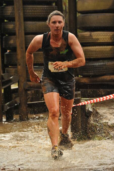 Muddy work: World-renowned obstacle runner Michelle Walker is taking charge of setting up an obstacle course for the Bega Show over the weekend. 