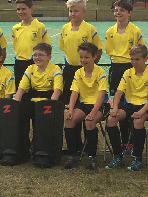 Beaming: Angus Carpenter was excited to line up with his team at the NSW PSSA boys hockey tournament recently. Picture: Supplied. 