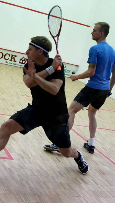 Quick pace: Brett Hyland winds up a backhand during the men's open final against Josh Larkin. Picture: Jacob McMaster