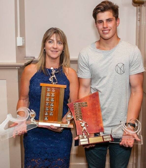 Squash champions: Club champions Leanne Crowe and Scott Galeano accept their trophies after a strong year on the courts. 