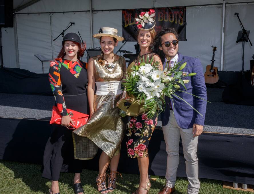 On trend on point: Judges at the Goulburn fashions on the field congratulate BDN sales manager Aimee Hay on her win before she competes in Randwick in April. 
