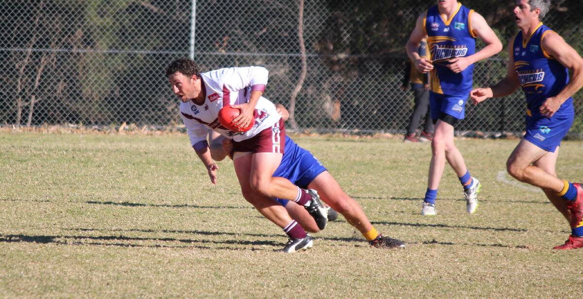 Honour roll: Luke Taylor, pictured escaping a Bermagui tackle, was among players named in the SCAFL team of the year as he leads the troops against Pambula this weekend. 