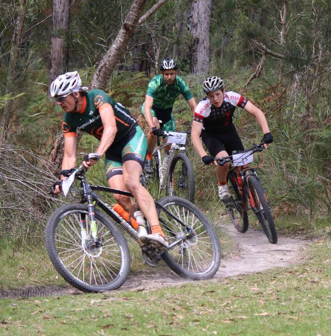On course: A group of mountain bikers hold a tight line around a corner during the round in Mandeni last month with the second ride to run next weekend in Tathra. 