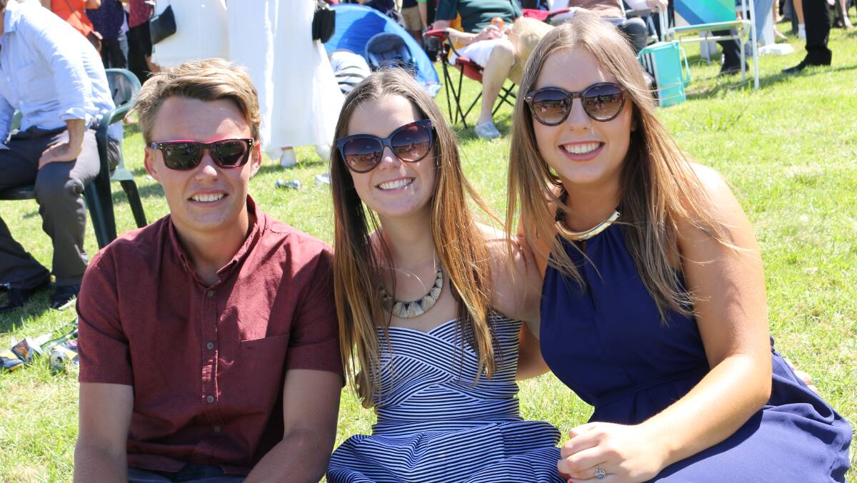 Fun in sun: Sunday will be a great chance to catch up with friends like this trio did at the Sapphire Coast Turf Club last year. Pictures: Jacob McMaster