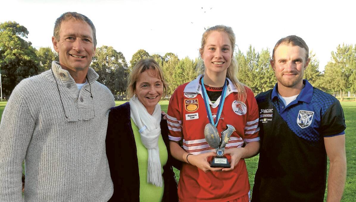 Gearing up: Kezie Apps with proud parents Jeff and Dawn Apps and Craig Dunham with Kezie lining up for the Auckland Nines again this week. 