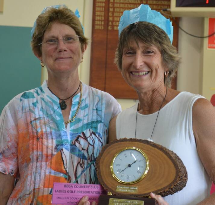 Bega club captain Monica Cullen presents Wendy Hergenhan with one of
her many trophies.