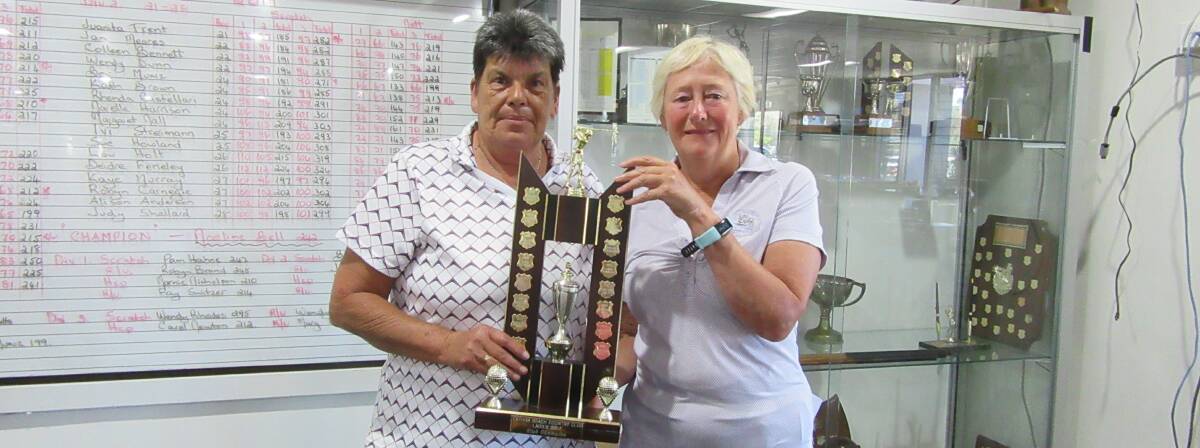 Great golf: Tathra ladies club champion Noeline Bell is congratulated by captain Wendy Rhodes after her win earlier this week.